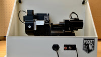 V2-10 with enclosure open, cutting